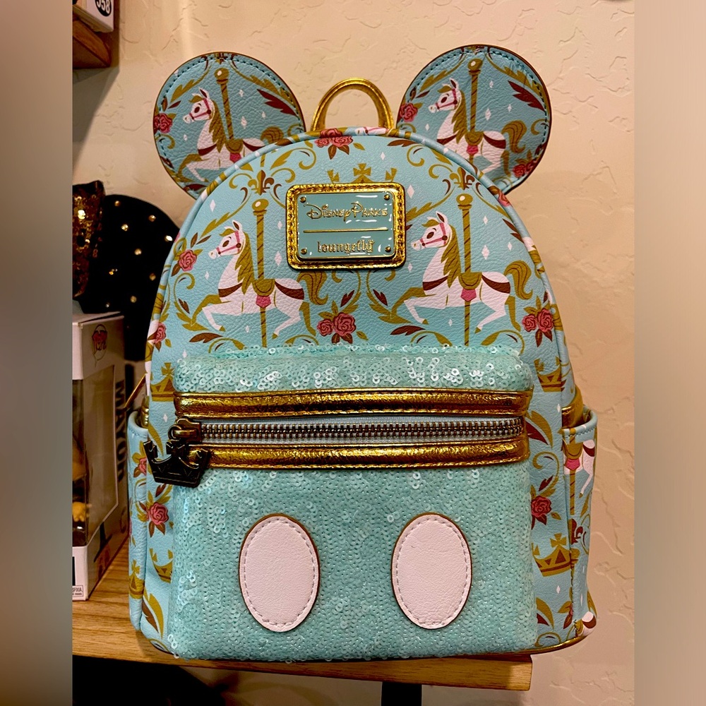 Loungefly Disney Parks Regal Carousel Mickey Main Attraction Backpack.